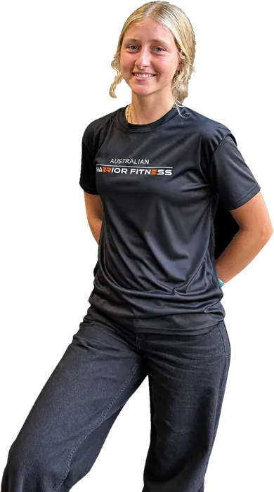 Smiling AWF Ninja coach in an AWF t-shirt