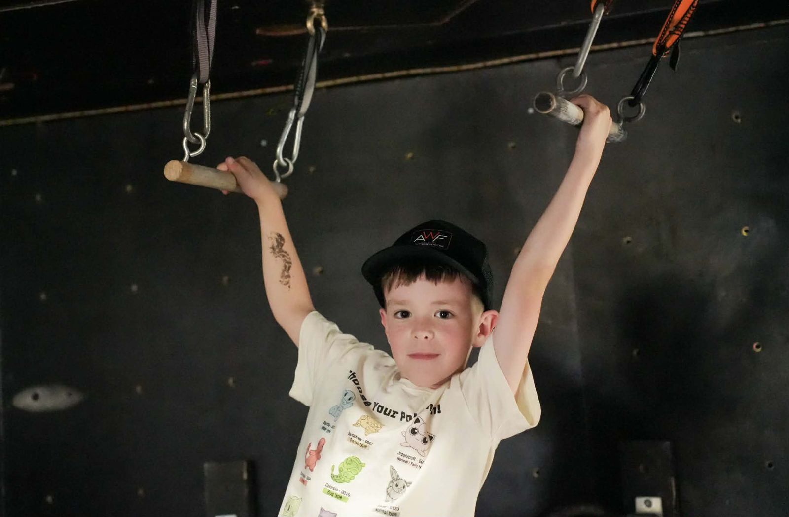 Kid on ninja obstacles at AWF Gosford